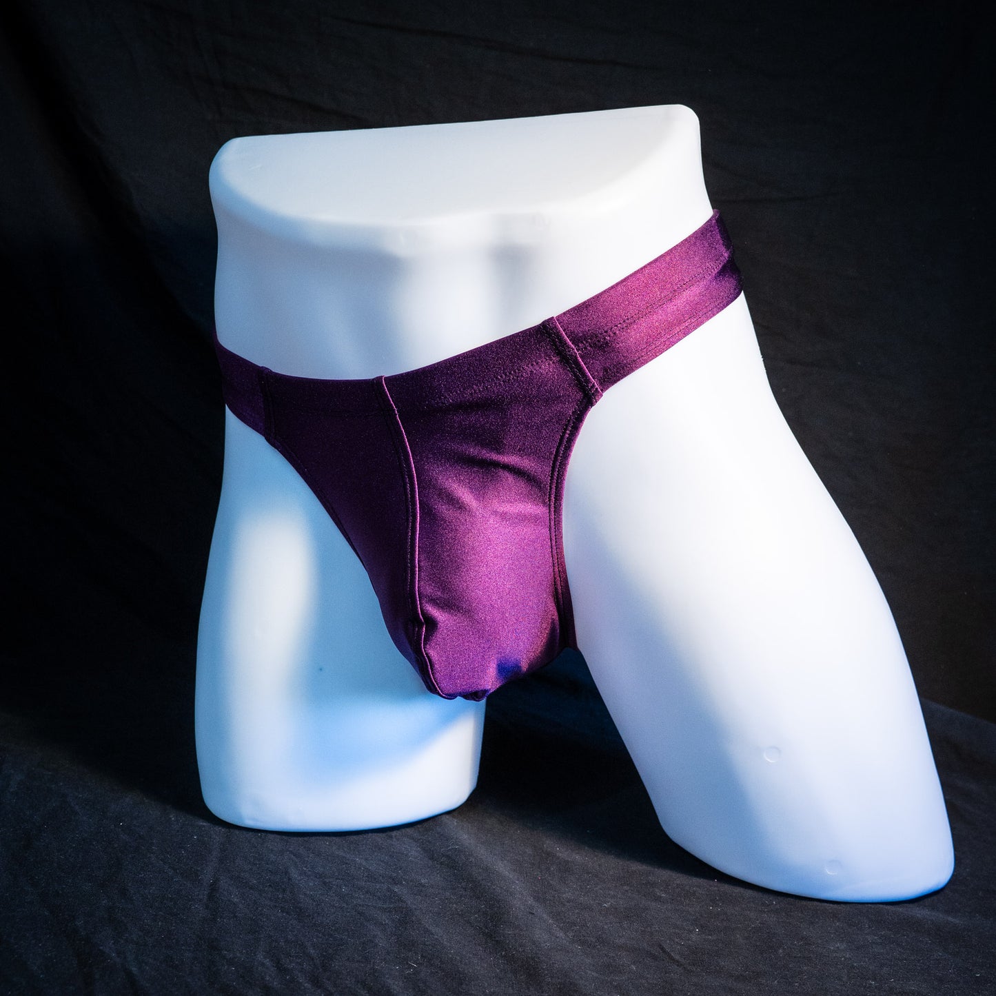 Men's plum purple robust cut thong underwear. full front angled view.