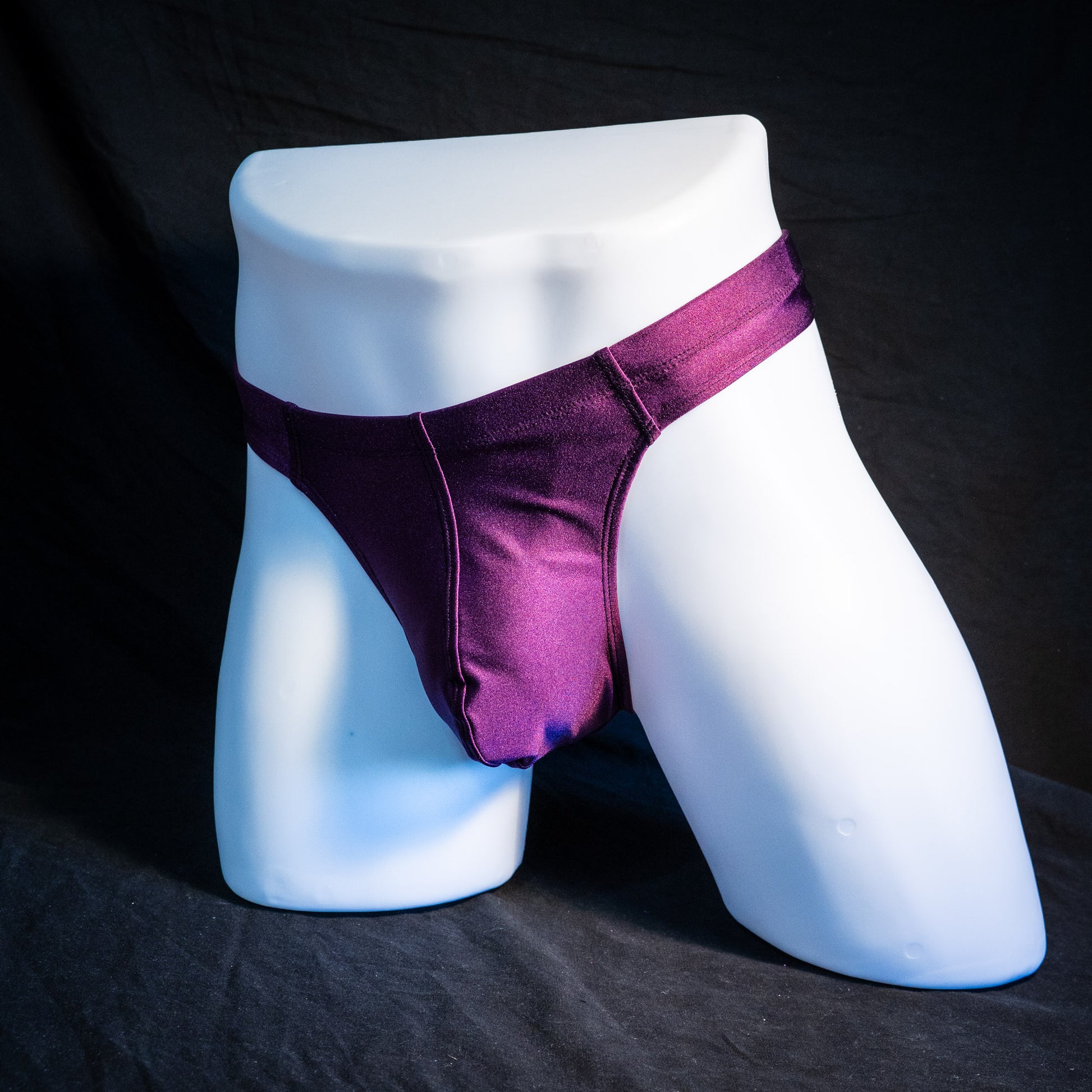 Men's plum purple robust cut thong underwear. full front angled view.