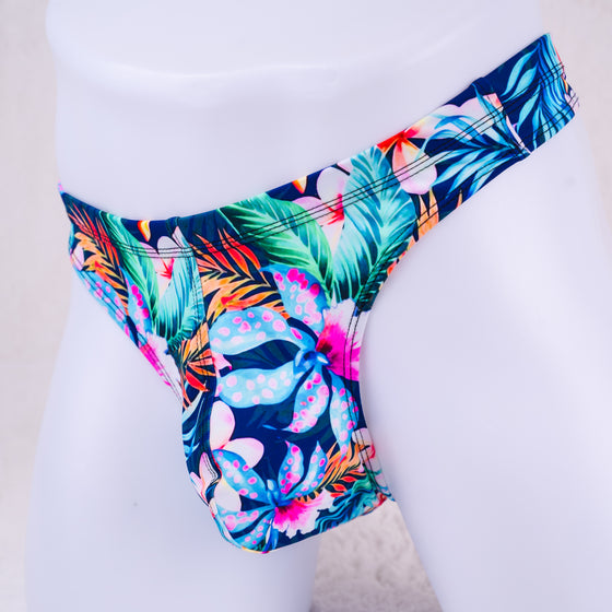 colorful mens thong underwear on a white mannequin
