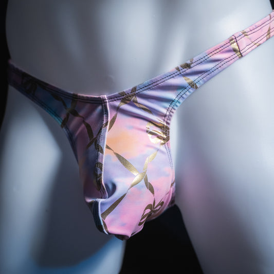 Men's pink and purple with gold foil chains thong, slim cut, angled front view.