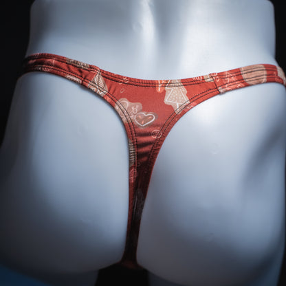 Men's red Christmas themed thong, slim cut, rear view.