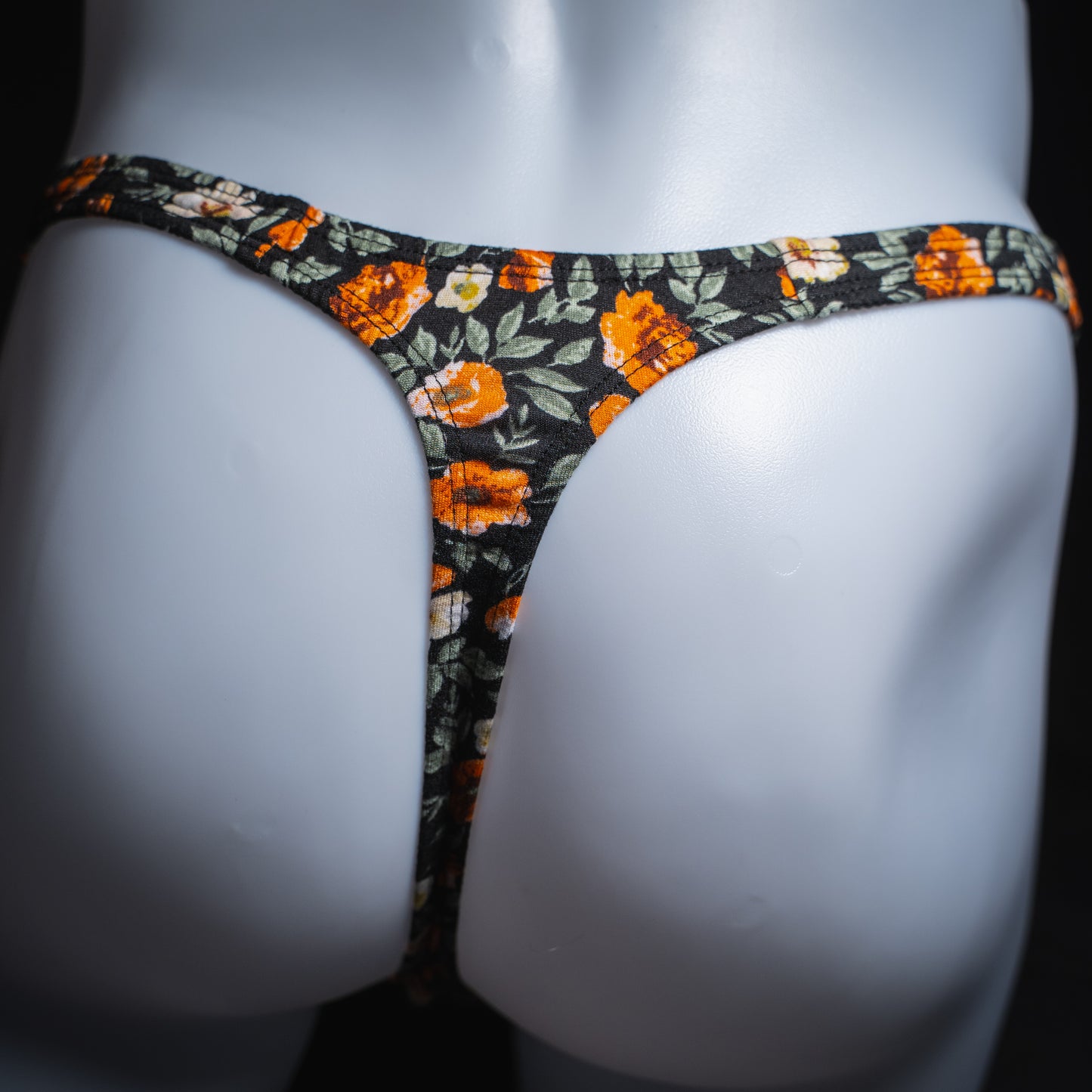 handmade mens thong underwear, classy floral design, soft polyester material, classic cut variation, back view