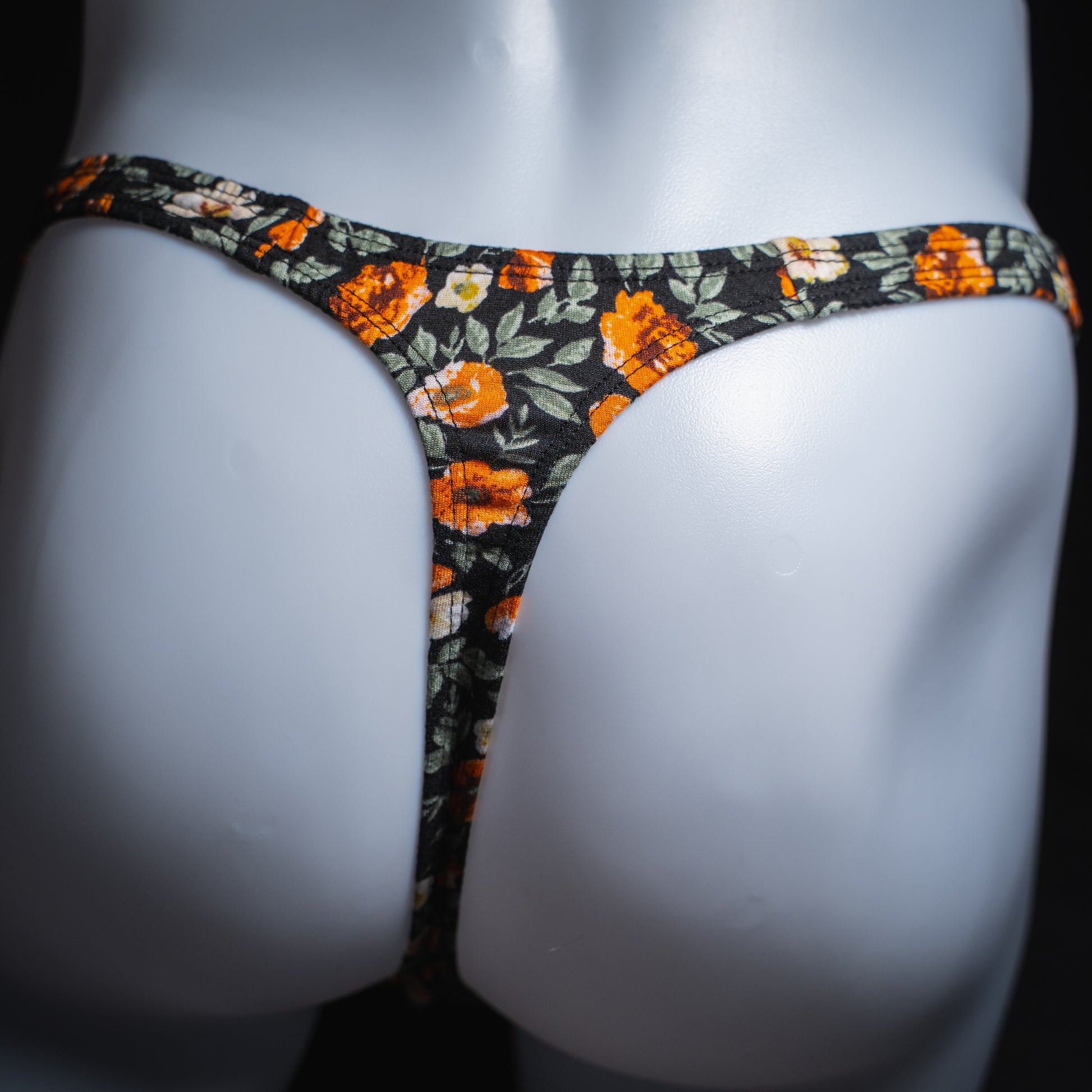handmade mens thong underwear, classy floral design, soft polyester material, classic cut variation, back view
