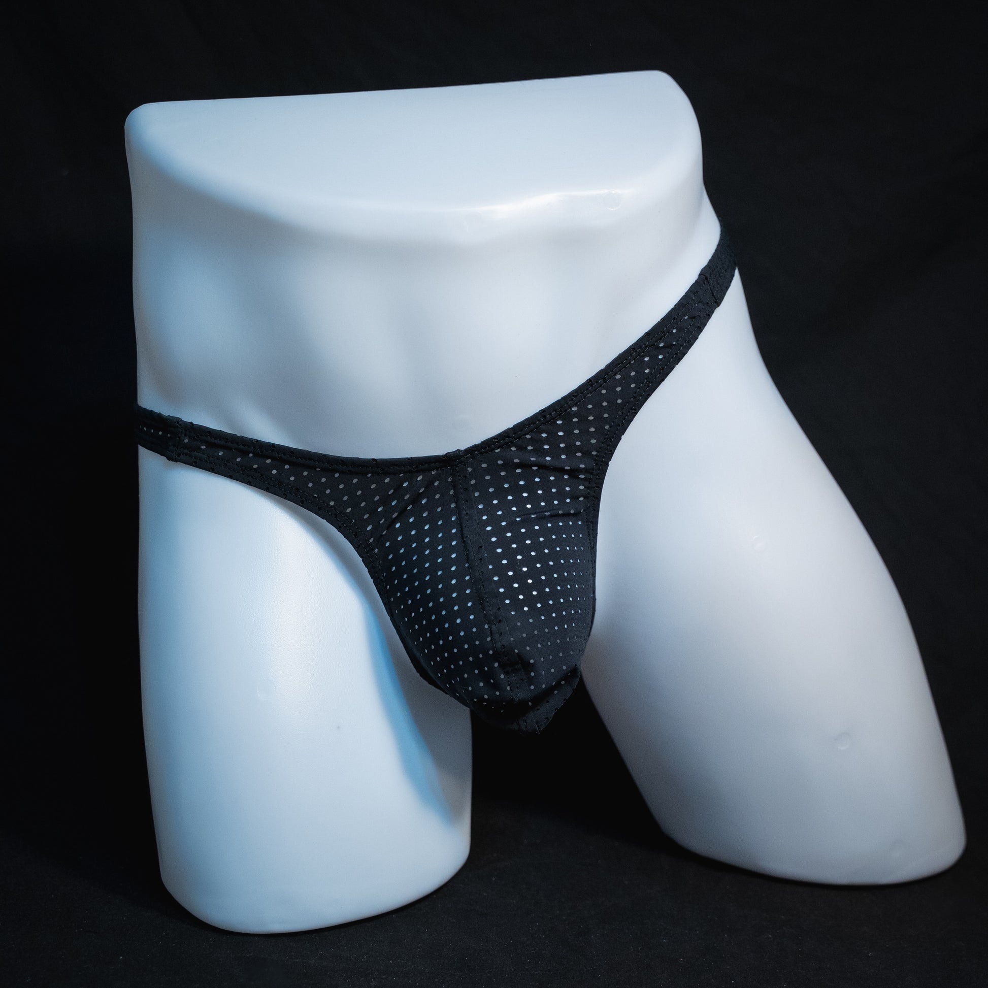men's black mesh thong underwear, slim cut, full front view.