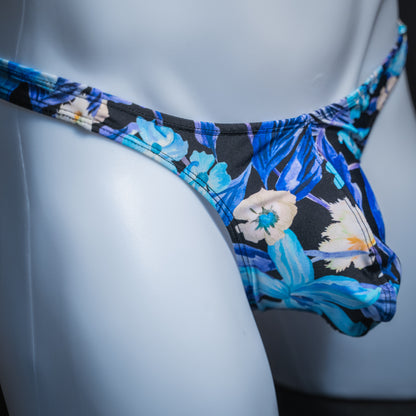 Men's blue floral thong, slim cut, side view.