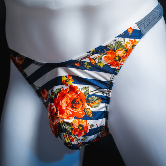 handmade mens thong underwear, floral striped pattern, polyester material, classic cut variation, angled front view