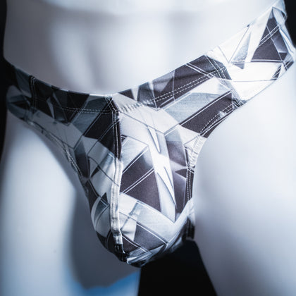 handmade mens thong underwear, black and white geometrical shapes print, brief cut design, angled front view