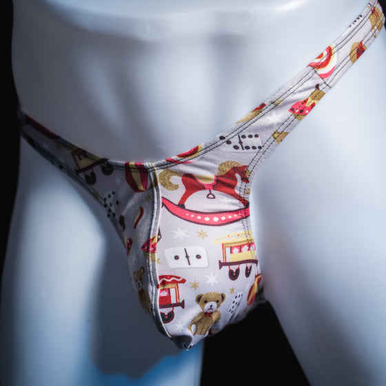 Men's Christmas gifts thong underwear, slim cut, angled front view.