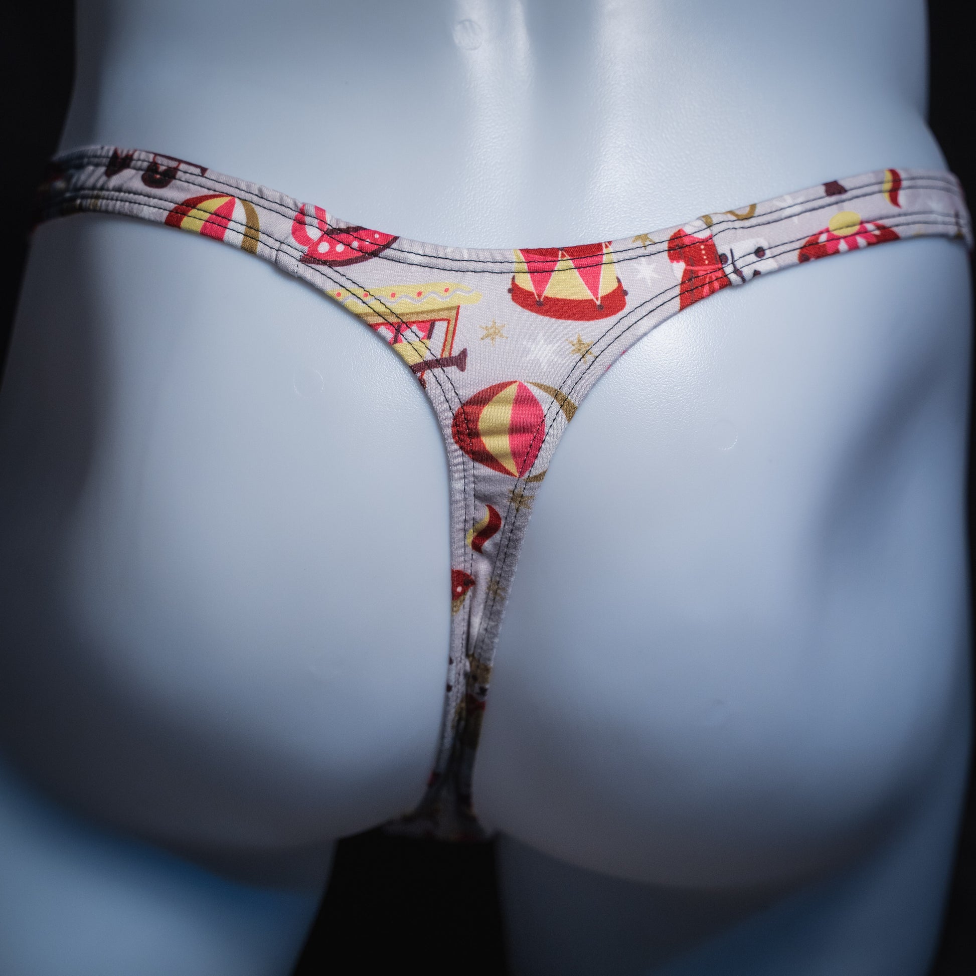 Men's Christmas gifts thong underwear, slim cut, rear view.