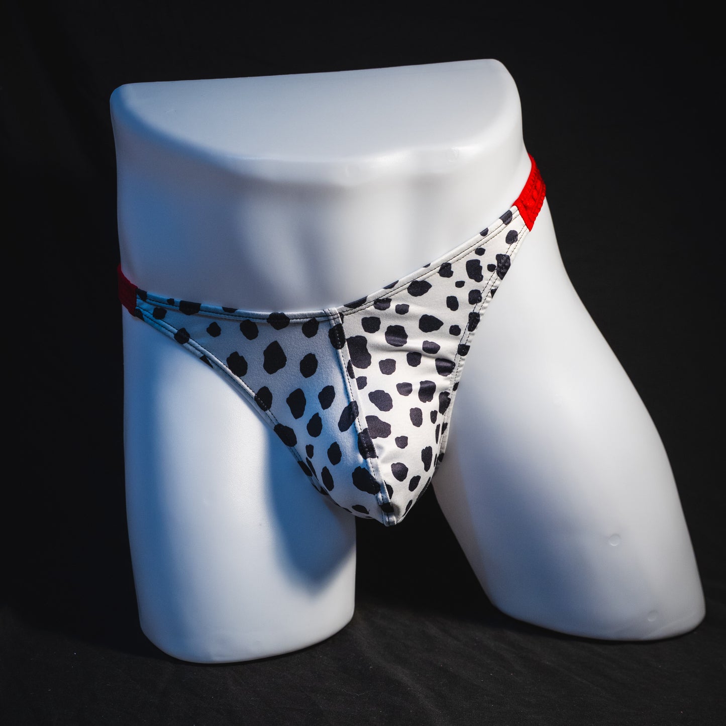 Men's dalmatian thong underwear, classic cut, full front view.