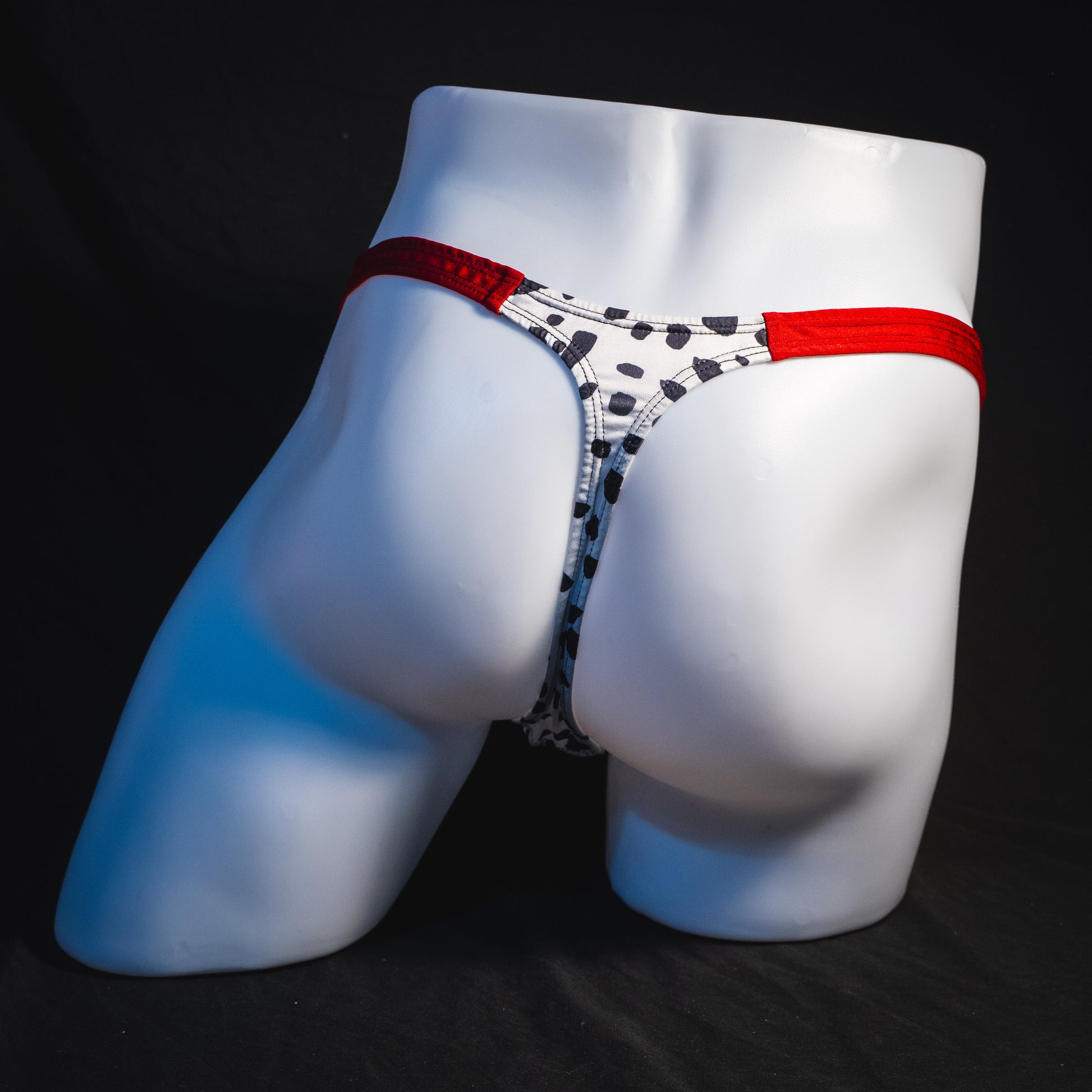 Men's dalmatian thong underwear, classic cut, full rear view.