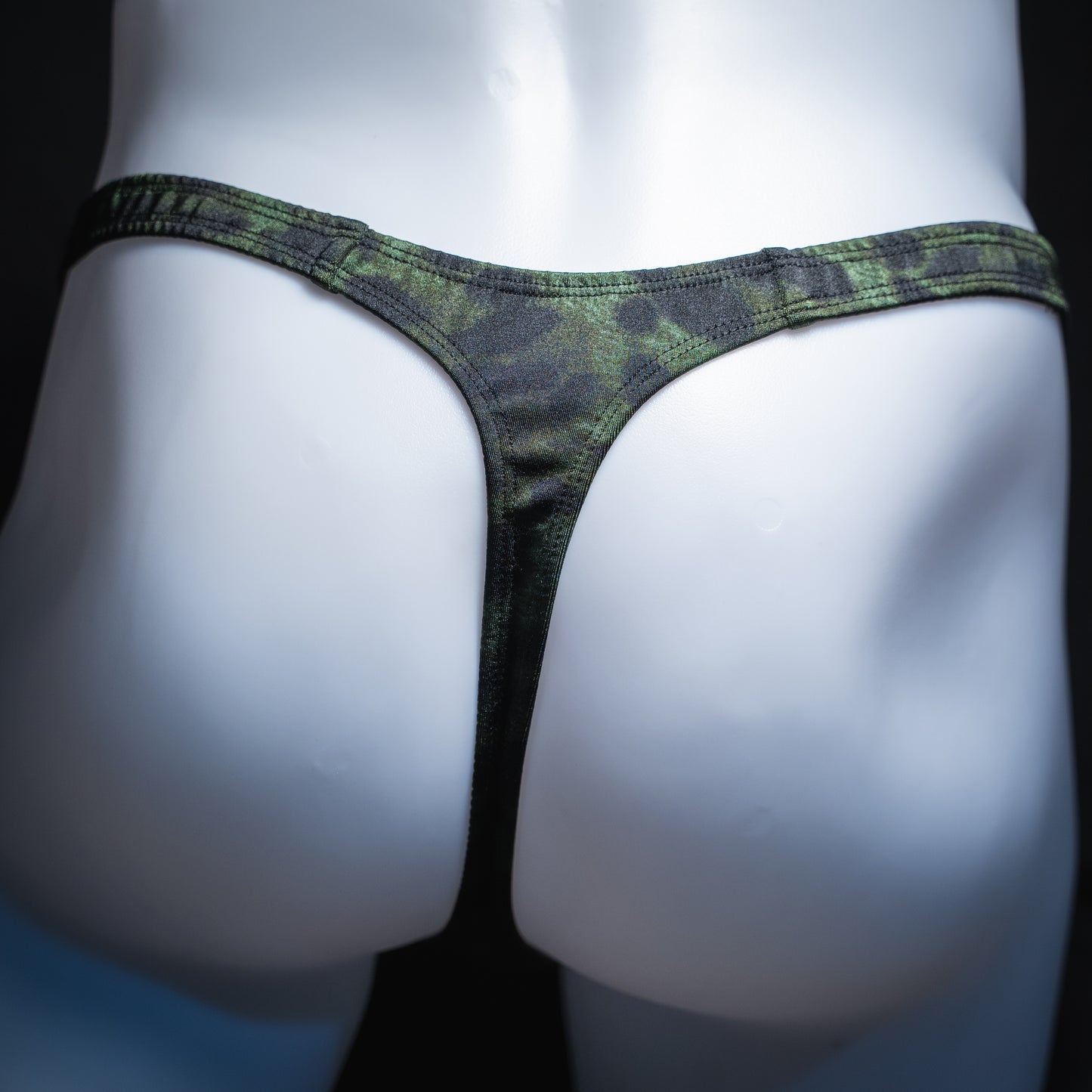 handmade mens thong underwear, green and black cheetah print, wet look spandex, back view