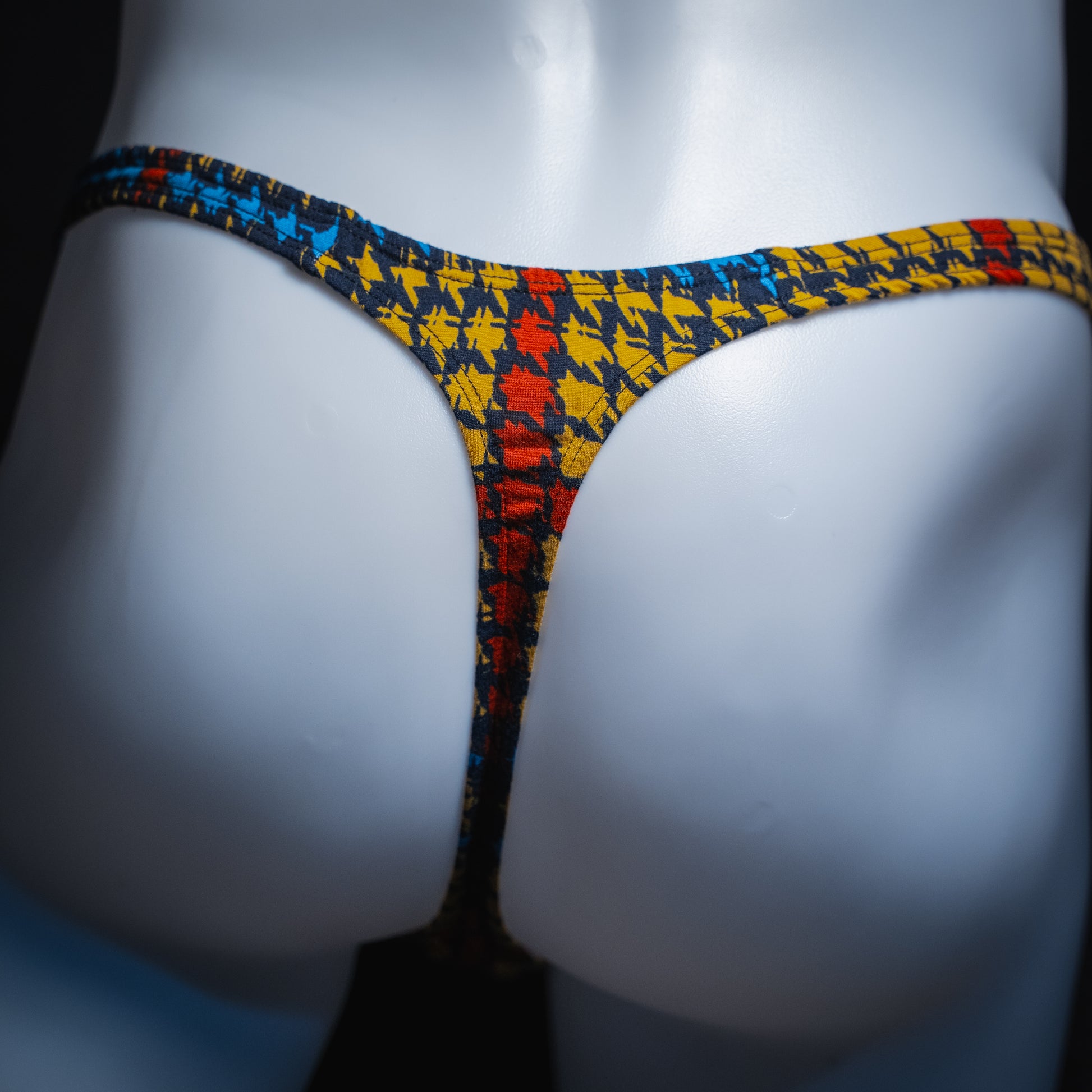 handmade mens thong underwear, jagged shapes print, soft polyester material, classic cut variation, back view