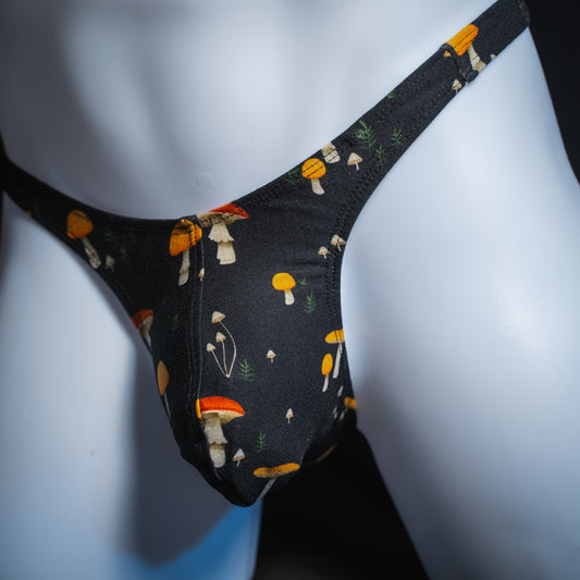 Men's mushroom thong, slim cut, angled front view.