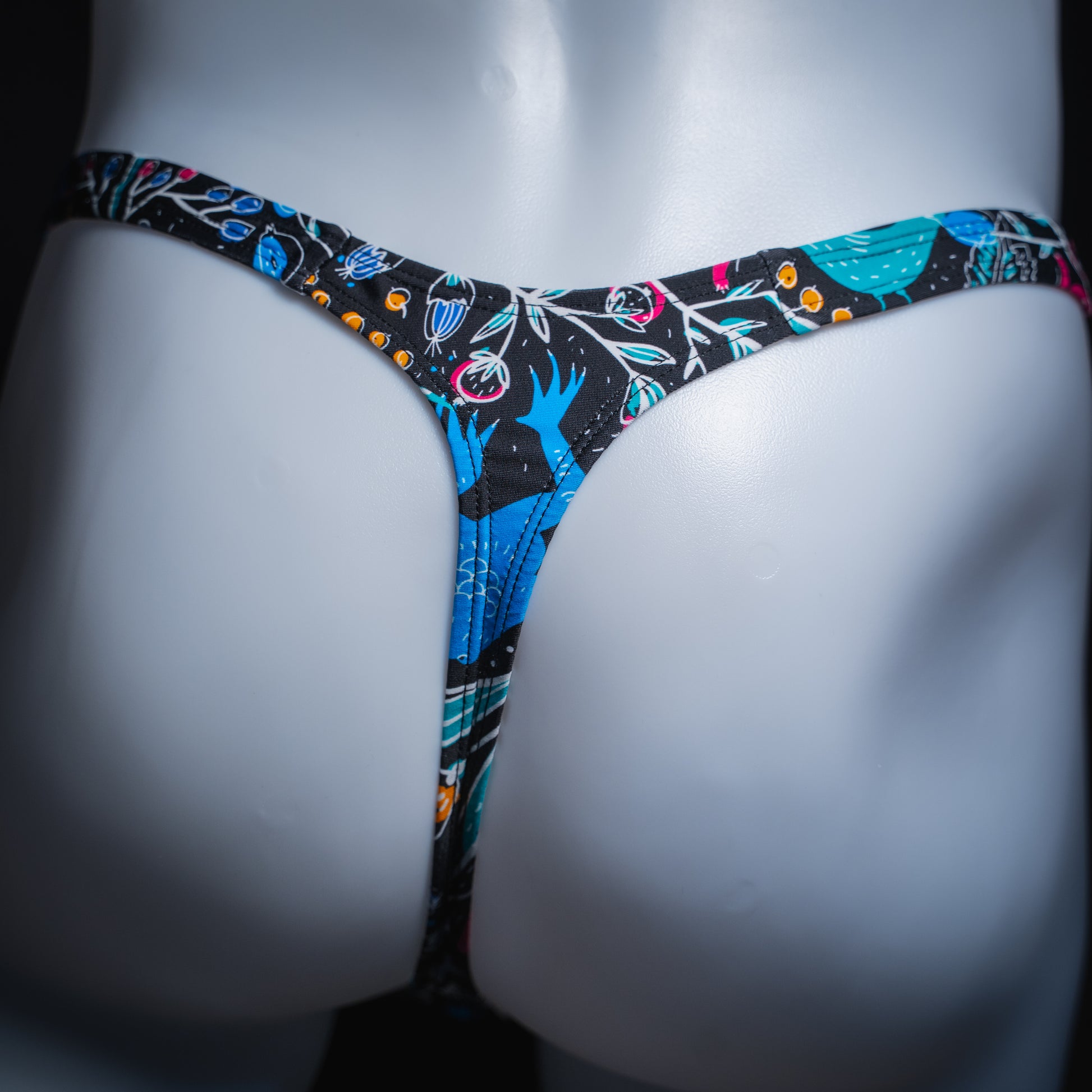 Men's thong underwear, slim cut, rear view.