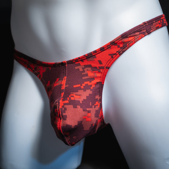 handmade mens thong underwear, red digital camo print, soft polyester material, slim cut variation, angled front view