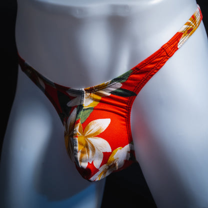 handmade mens thong underwear, red floral print, soft polyester material, slim cut variation, angled front view