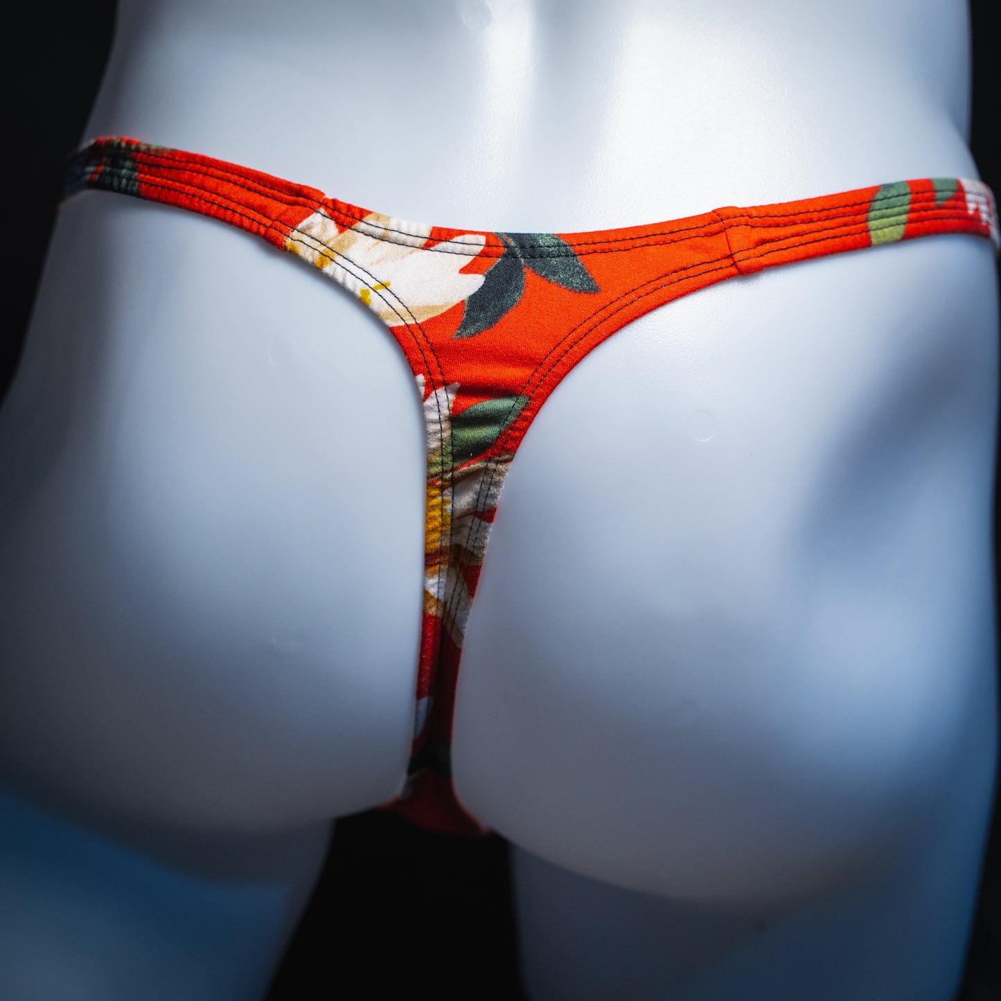 handmade mens thong underwear, red floral print, soft polyester material, slim cut variation, back view
