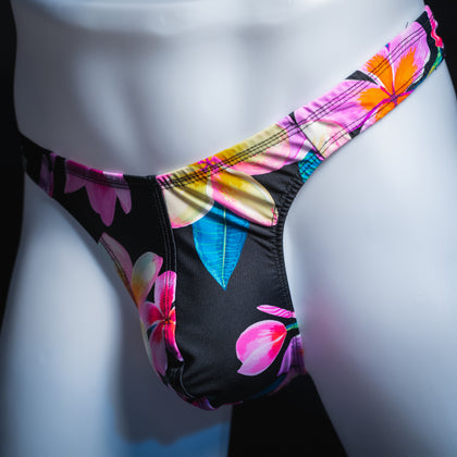 handmade mens thong underwear, pink floral pattern, spandex material, robust cut design, angled front view