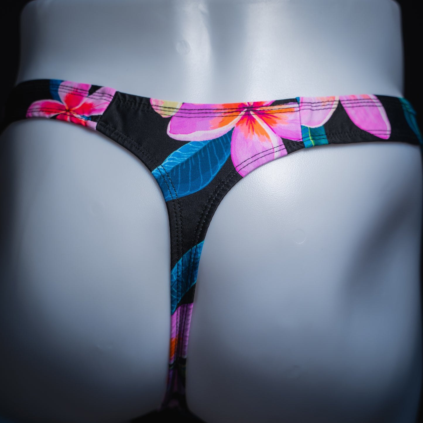 handmade mens thong underwear, pink floral pattern, spandex material, robust cut design, back view