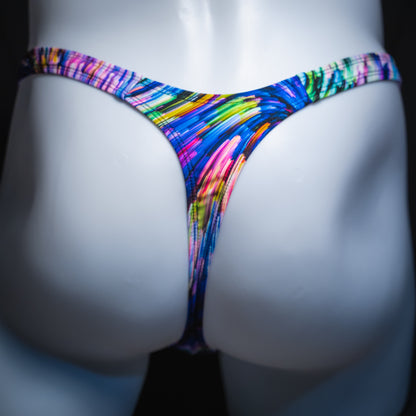 Men's colorful light trails thong, slim cut, rear view.