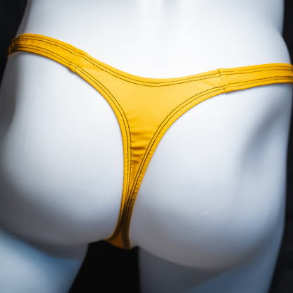 Men's solid golden yellow thong, slim cut, rear view.