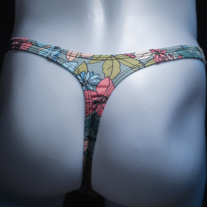 Men's blue floral thong, slim cut, rear view.