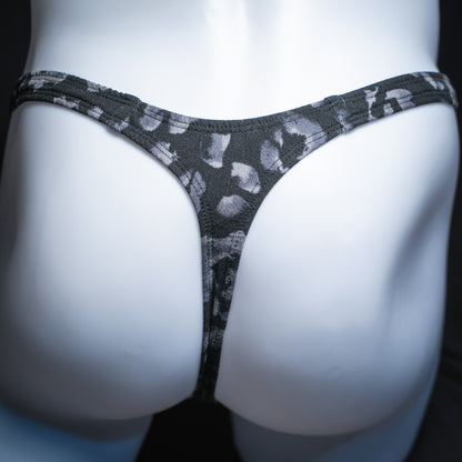 Men's black and gray cheetah thong, slim cut, rear view.