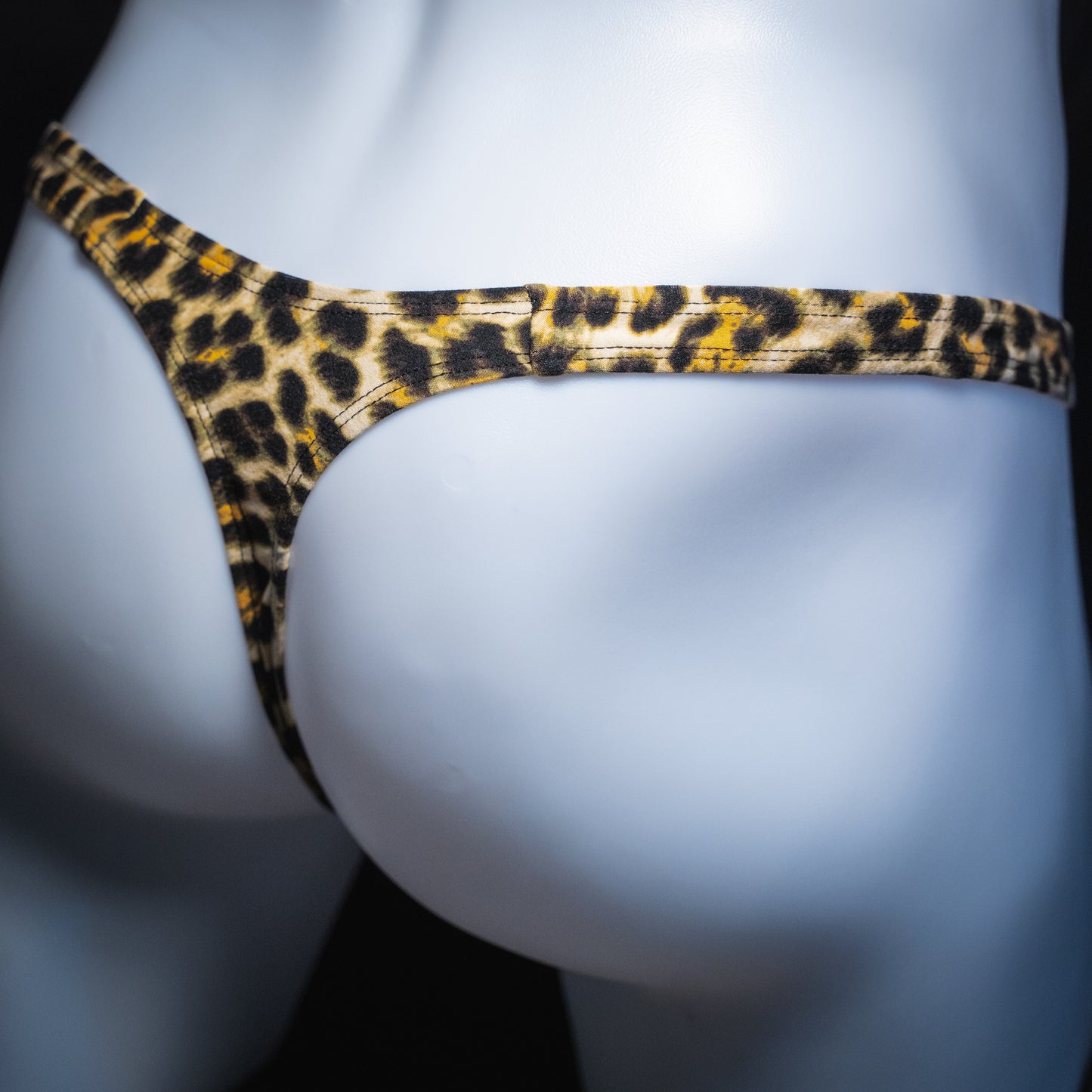 men's thong underwear, cheetah print, soft polyester, handmade, classic cut, angled back view