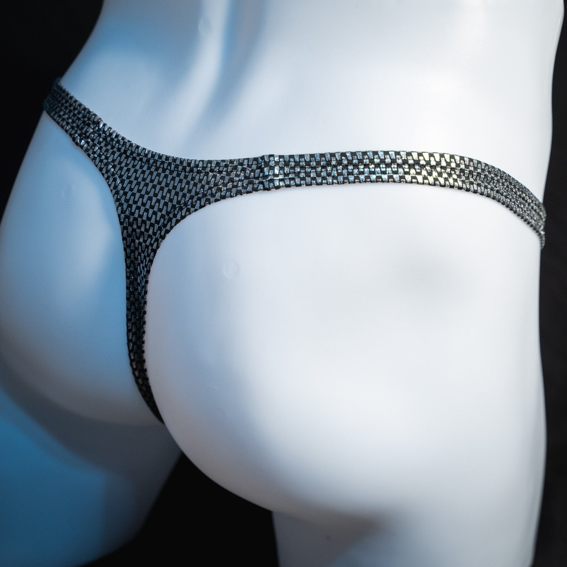 handmade mens thong underwear, silver metallic chains print, classic cut variation, spandex material, angled back view