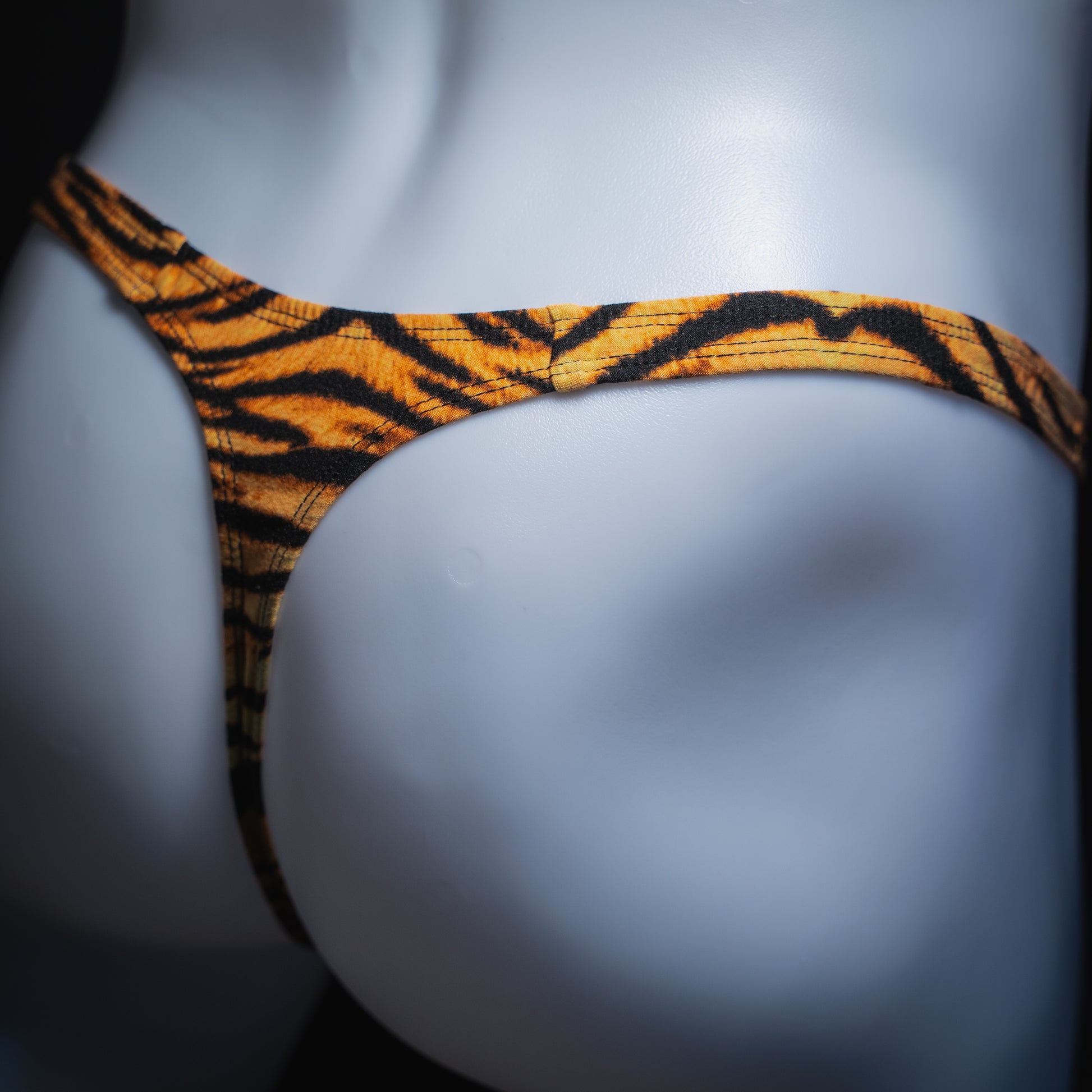 handmade mens thong underwear, tiger stripe print, soft polyester, offset back view
