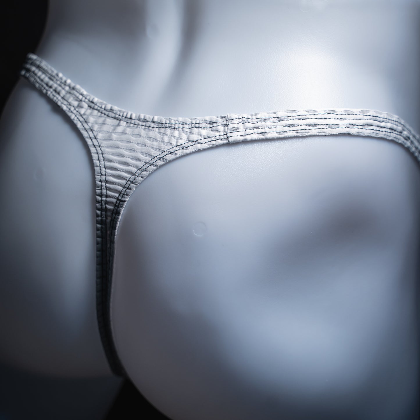 handmade mens thong underwear, white yoga mesh material, angled back view