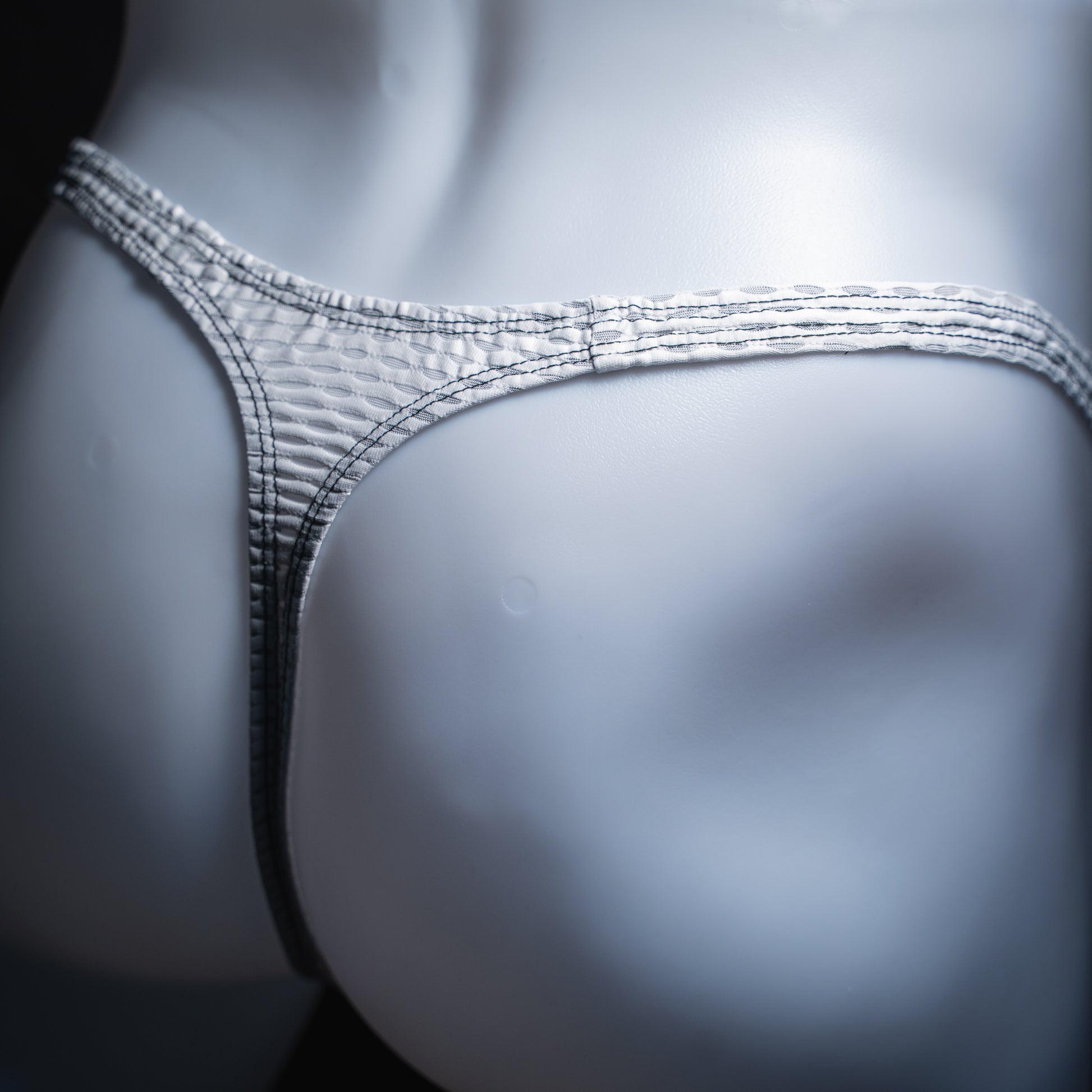 handmade mens thong underwear, white yoga mesh material, angled back view