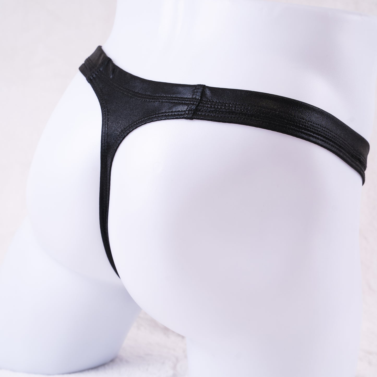 Men's pouch-less thong underwear, rear view.